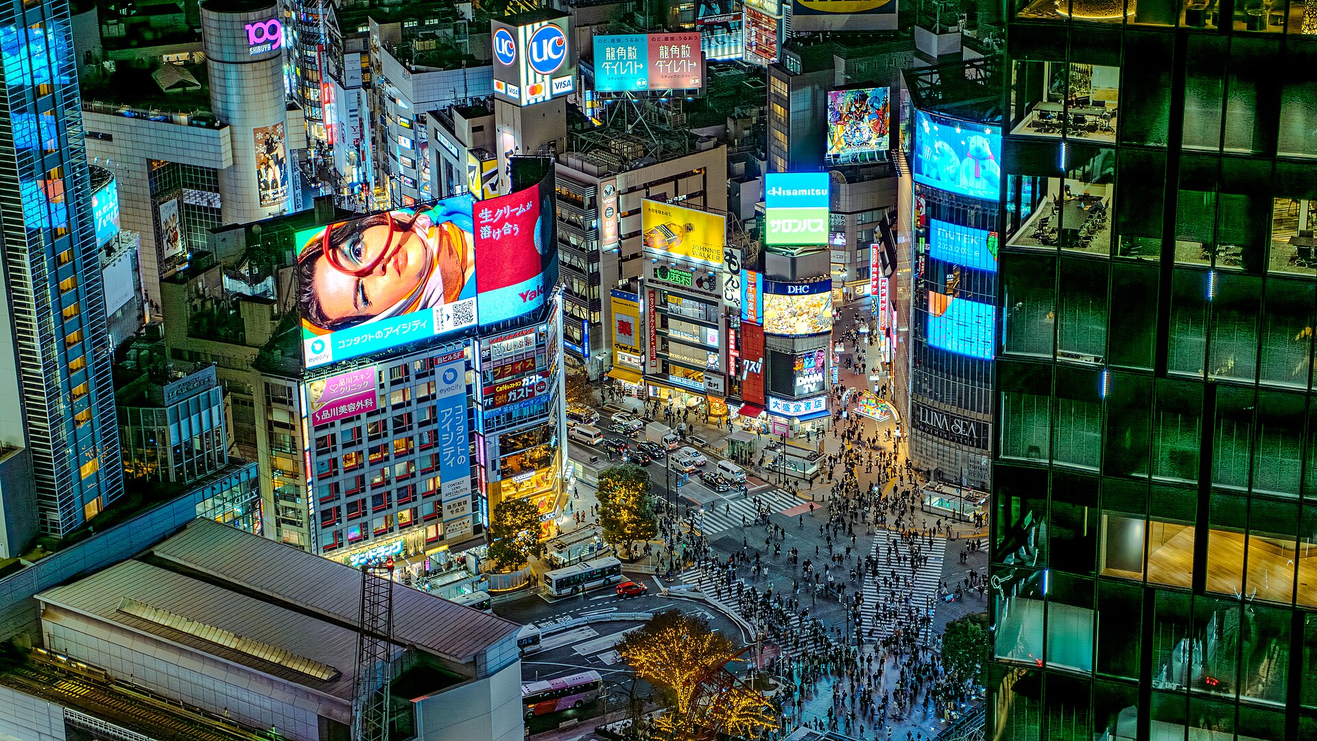 Neon night at Shibuya Crossing in Tokyo